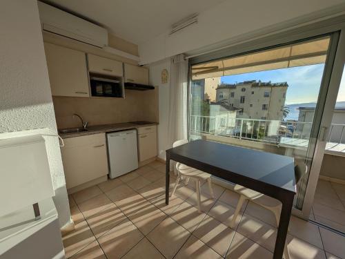 Studio Proche Plage et Commerces - Climatisé, Parking, Wi-Fi