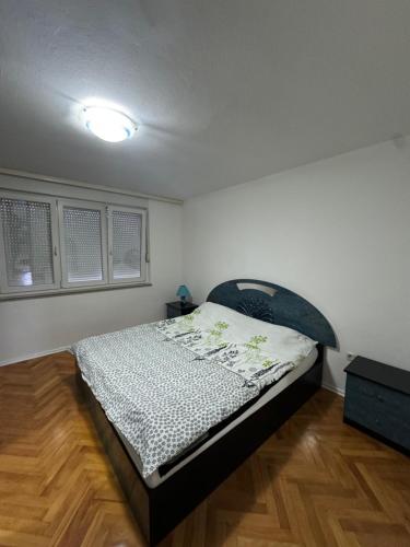 a bedroom with a bed in a room at Apartman Jojo in Čapljina
