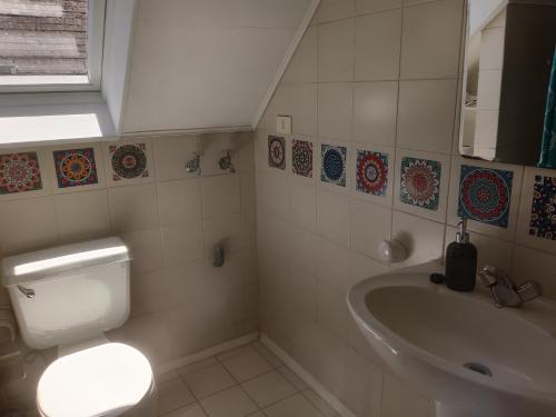 Et badeværelse på Cómoda casa familiar en Barrio el Bosque, Valdivia