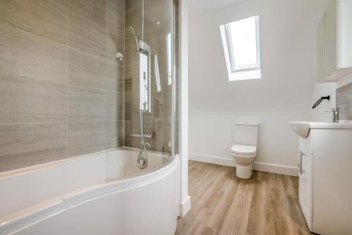 a bathroom with a shower and a toilet at 3 Bed in Tintagel oc-e32938 in Tintagel