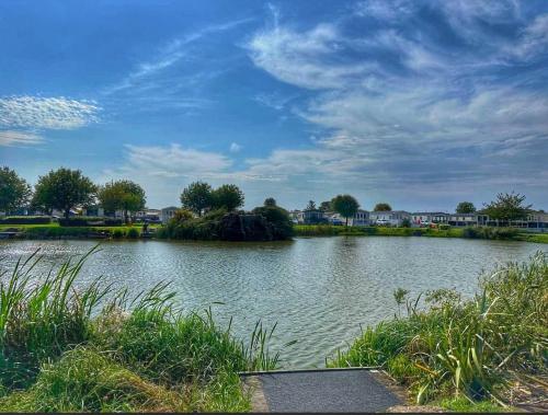 a large body of water under a cloudy sky at 52 Sherringham Way in Patrington
