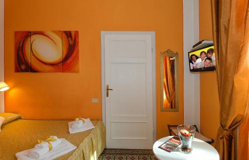 Postel nebo postele na pokoji v ubytování B&B La Mimosa