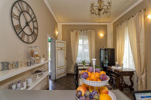 TV a/nebo společenská místnost v ubytování B&B La Mimosa