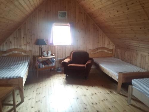 Postel nebo postele na pokoji v ubytování Hænuvík Cottages