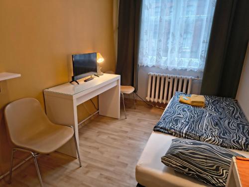 En eller flere senge i et værelse på U Szermierzy