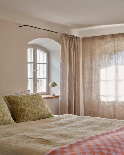 a bedroom with a bed and a window at Denharten in Tann