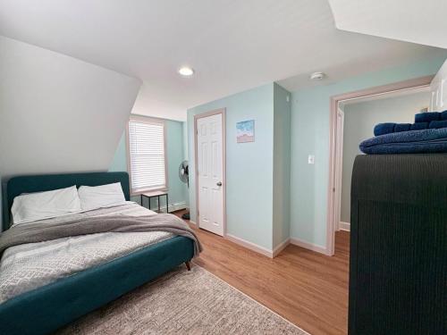 En eller flere senge i et værelse på Seabreeze Sanctuary