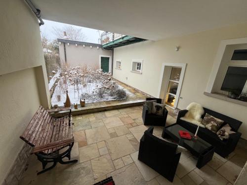 an aerial view of a living room with a patio at Saar-Lor-Lux-Perle in Merzig