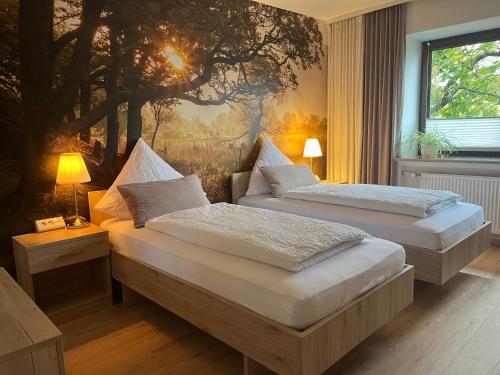 En eller flere senge i et værelse på Ferienwohnung JuraSchatz