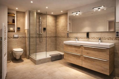 a bathroom with a shower and a sink and a toilet at Loft Prenium PETITE FRANCE-idéal mission Pro-long séjour in Strasbourg