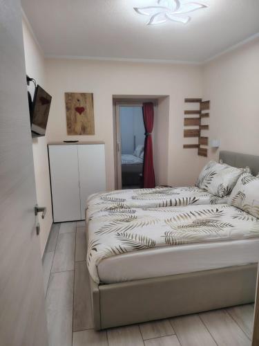 a bedroom with two beds in a room at Lika in Livigno