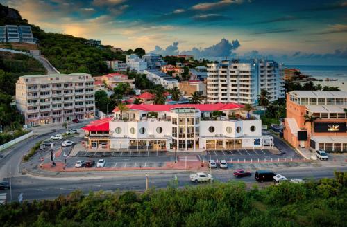 an aerial view of a city with buildings at Commodore Suites, SureStay Collection by Best Western in Simpson Bay