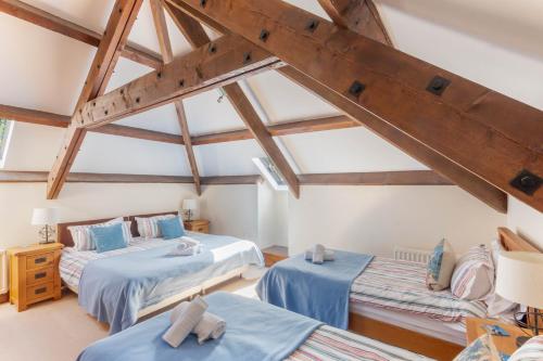 Postel nebo postele na pokoji v ubytování Puffin Cottage, Bamburgh