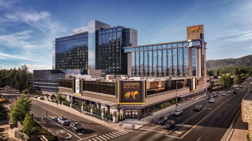 a rendering of a building with cars on a street at Caesars Republic Lake Tahoe, A Caesars Destination in Stateline