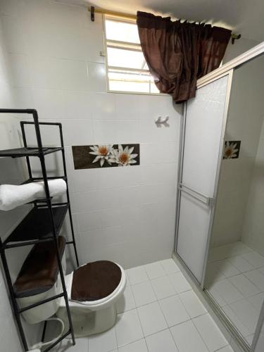 a bathroom with a shower and a toilet in it at Suite María Paula in Colombia