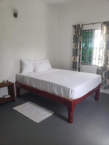 Tempat tidur dalam kamar di Dragonfly