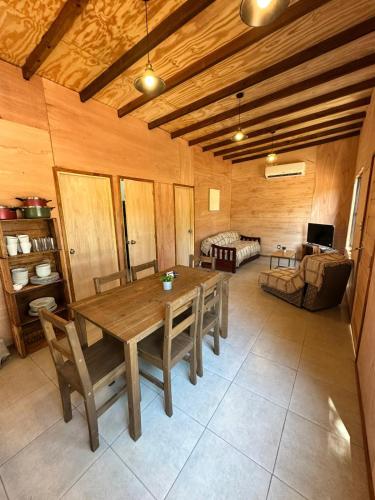 a living room with a wooden table and a couch at Refugio del Mar 3 in Ocean Park