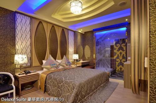 Cama o camas de una habitación en Zheng Yi Classic Hotel & Motel