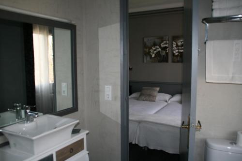 Una habitación en Hotel L'Ast