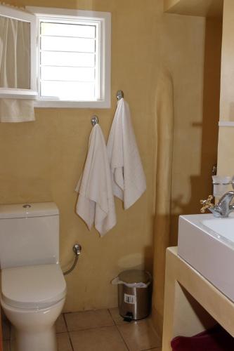 A bathroom at Traditional House by The Beach