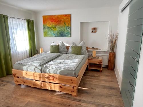 En eller flere senge i et værelse på Gästehaus zum Alpenjäger