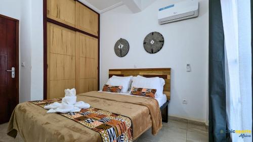 Llit o llits en una habitació de Studio Chic avec parking