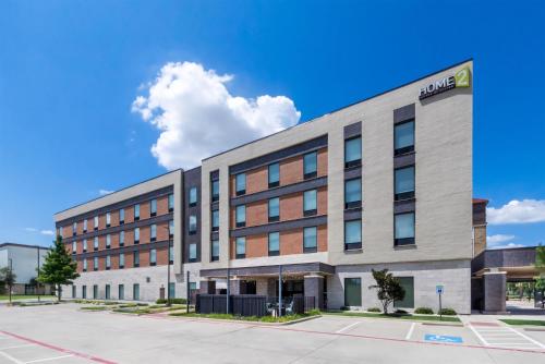 a rendering of the new hampton inn suites hotel at Home2 Suites By Hilton Dallas Grand Prairie in Grand Prairie
