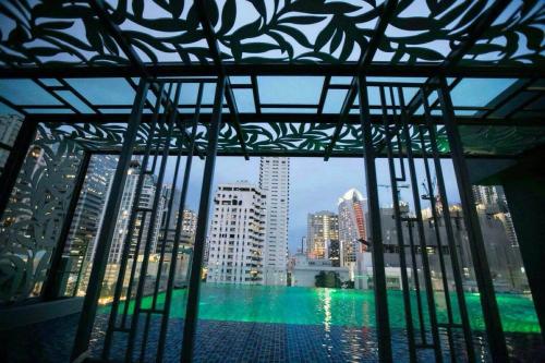 a view of a city skyline from a building at Arte Hotel - SHA Extra Plus in Bangkok