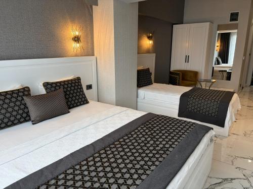 Cama o camas de una habitación en Park Milano Hotel