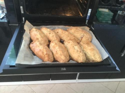 a group of breads are cooking in an oven at Gwynarth B&B in Wadebridge