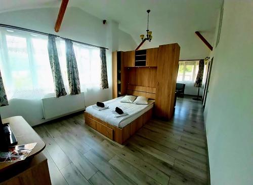 Postel nebo postele na pokoji v ubytování Casa Ostrov