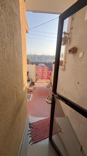 a view from a window of a building at Madhuram Township in Jamnagar