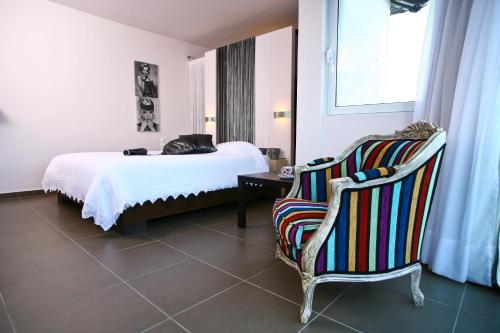 Pantokrator Hotelにあるベッド