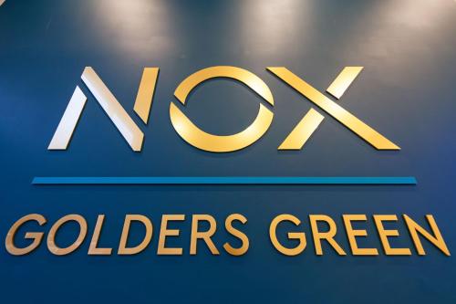 a sign for azona soldiers green is shown at NOX Golders Green in London