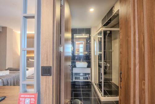 a bathroom with a sink and a toilet in a room at Best House Hotel OLD TOWN in Istanbul