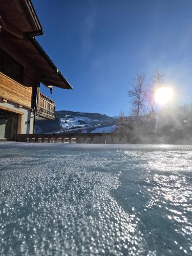 an ice skating rink with snow on the ground at Rocks Schladming in Schladming