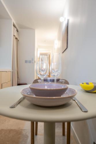 Logement elegant avec patio prive et climatisation
