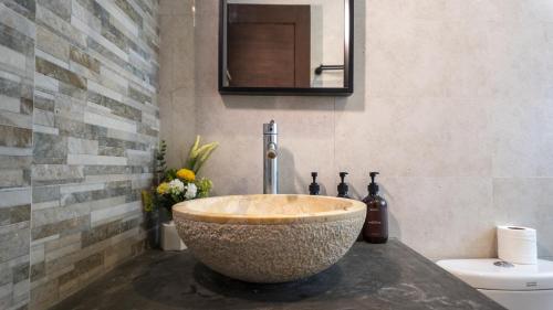 a bathroom with a large bowl sink on a counter at 3BR Private Pool Villa in Central Seminyak - Walk to Cafés & Shops in Seminyak