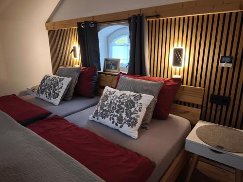 a bedroom with two beds and a window at Bahnhof Droyßig - Übernachten im Denkmal in Droyßig