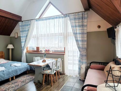 Llit o llits en una habitació de Family Relax Widoki