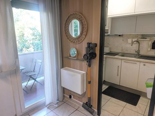 MICHELET Studio climatisé avec balcon et parking ferme