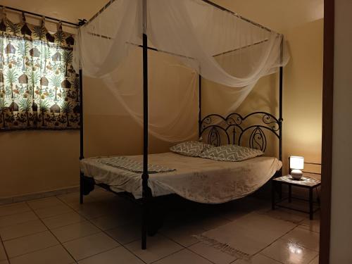 Llit o llits en una habitació de Chez sandrine