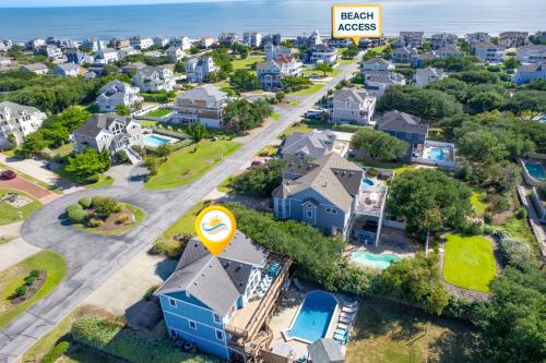 an aerial view of a residential neighborhood with houses at 2070 - Sol Mates in Duck