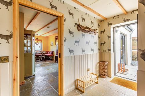 a hallway with deer decals on the wall at 2 Bed in Glendale oc-b34216 in Glendale