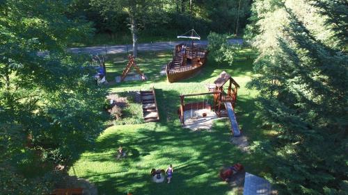 an overhead view of a park with a playground at Hotel a restaurace U Vychopňů in Vsetín