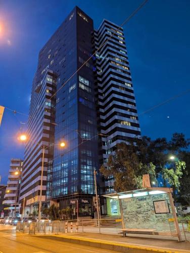 a tall building with a sign in front of it at Premium Apartment with 2 Beds 1 Bath in Melbourne