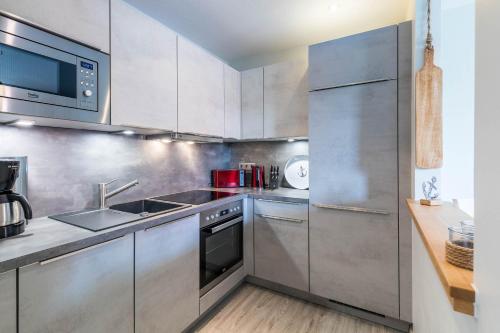 Kuchyň nebo kuchyňský kout v ubytování Ferienwohnung Pacific