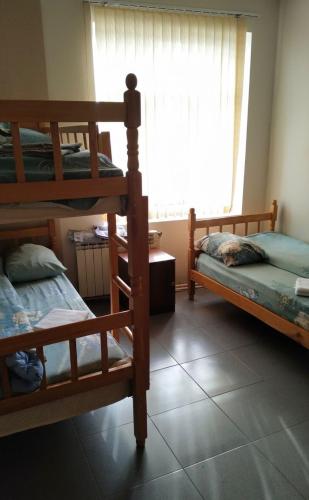 Voodi või voodid majutusasutuse Ganja Hostel toas