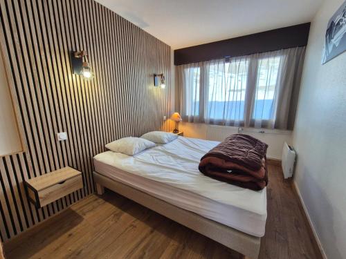 Appartement skis aux pieds avec balcon et cuisine équipée