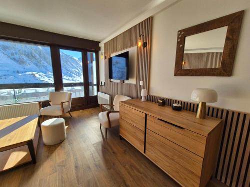 Appartement skis aux pieds avec balcon et cuisine équipée